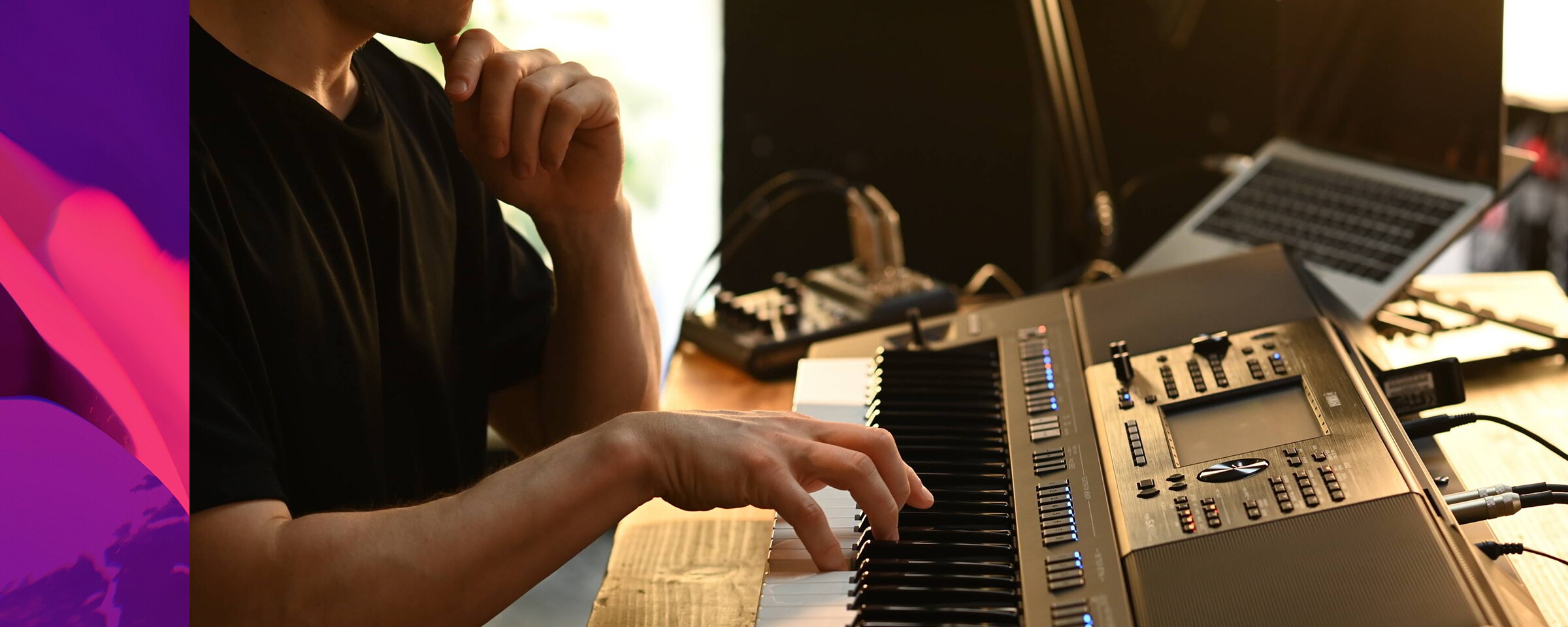 A person playing Yamaha Arranger Workstation PSR-SX920 