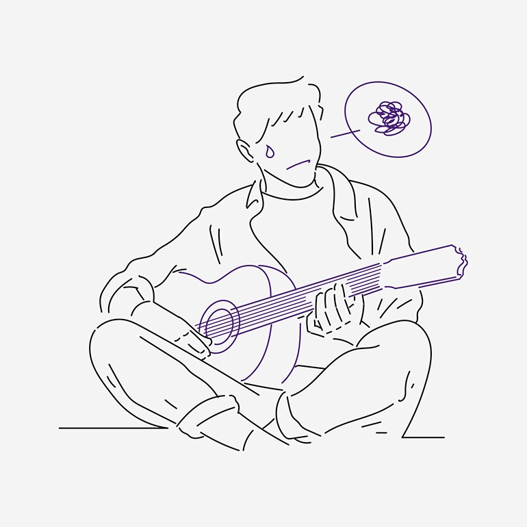 Een man die moeite heeft met gitaar oefenen